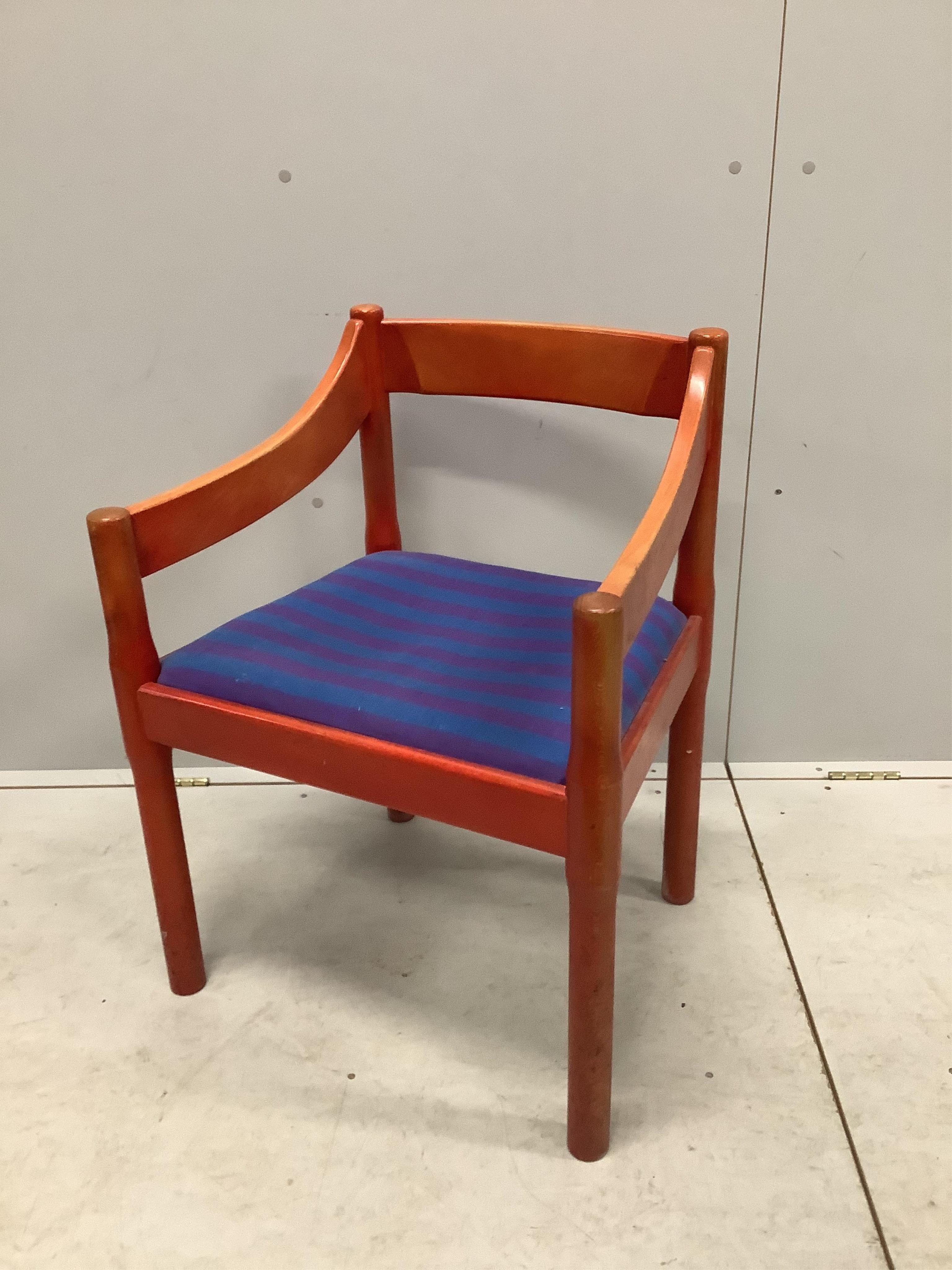 An early Habitat Magistretti style red stained beech settee, width 198cm, depth 84cm, height 69cm and a matching elbow chair. Condition - poor to fair